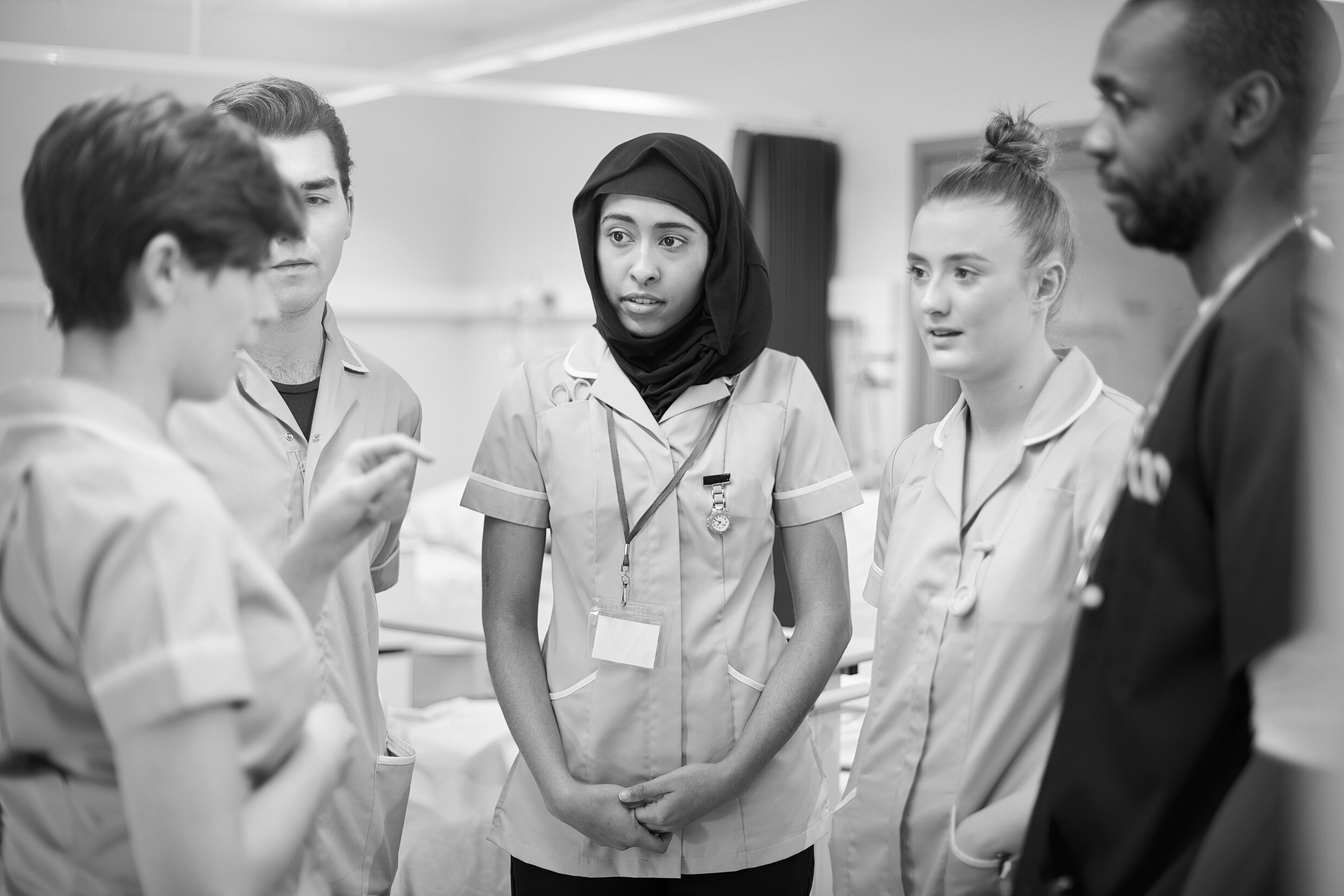 young nursing team with senior nurse